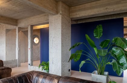 Brutalist Duplex Apartment in de Riverside Tower | Studio Okami Architects